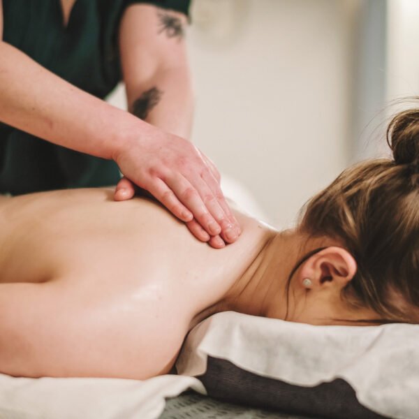 Massage - close up of a woman getting her back massaged
